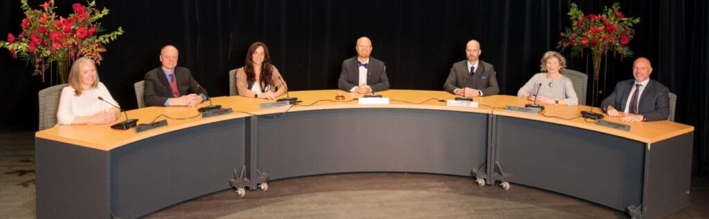 Whistler's Mayor and Council pose for a photo during a Council meeting