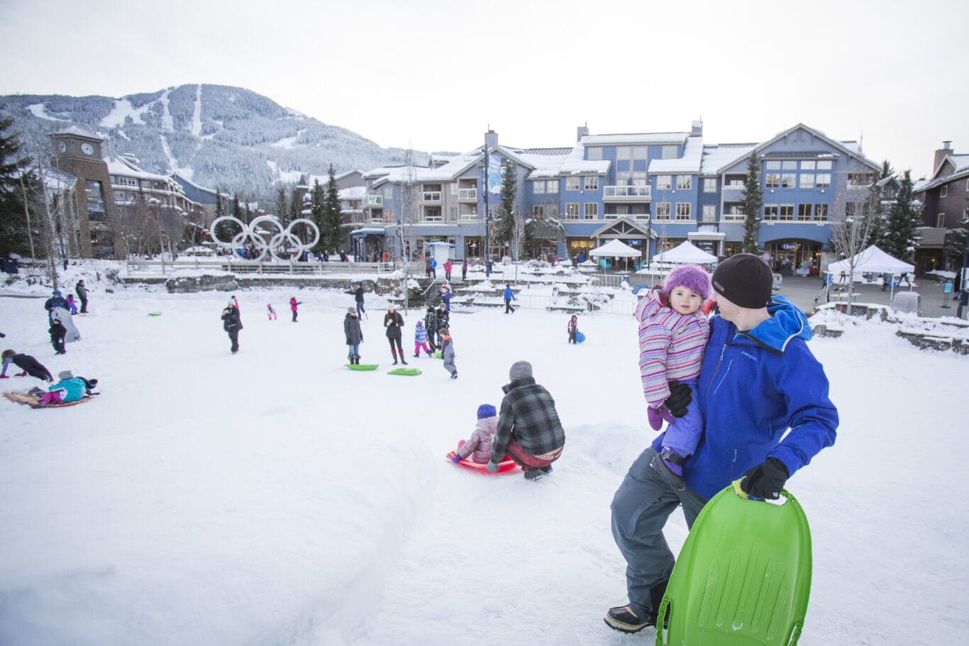 Kids and families playing at Whistler Olympic Plaza.