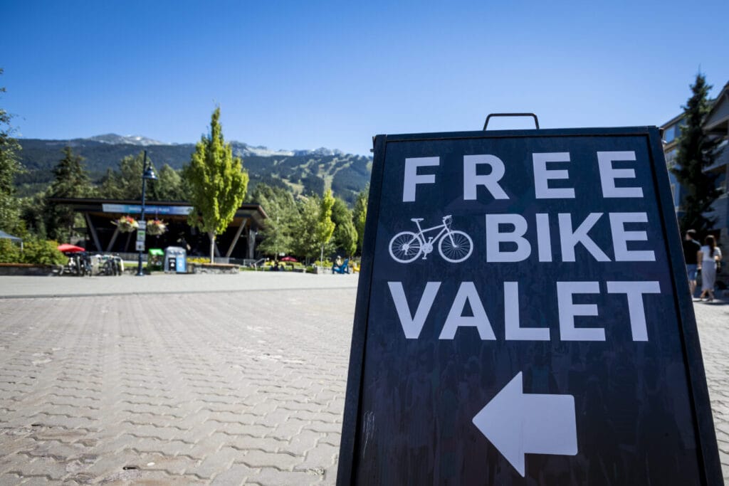 Sign directing to the Free Bike Valet in Whistler Olympic Plaza