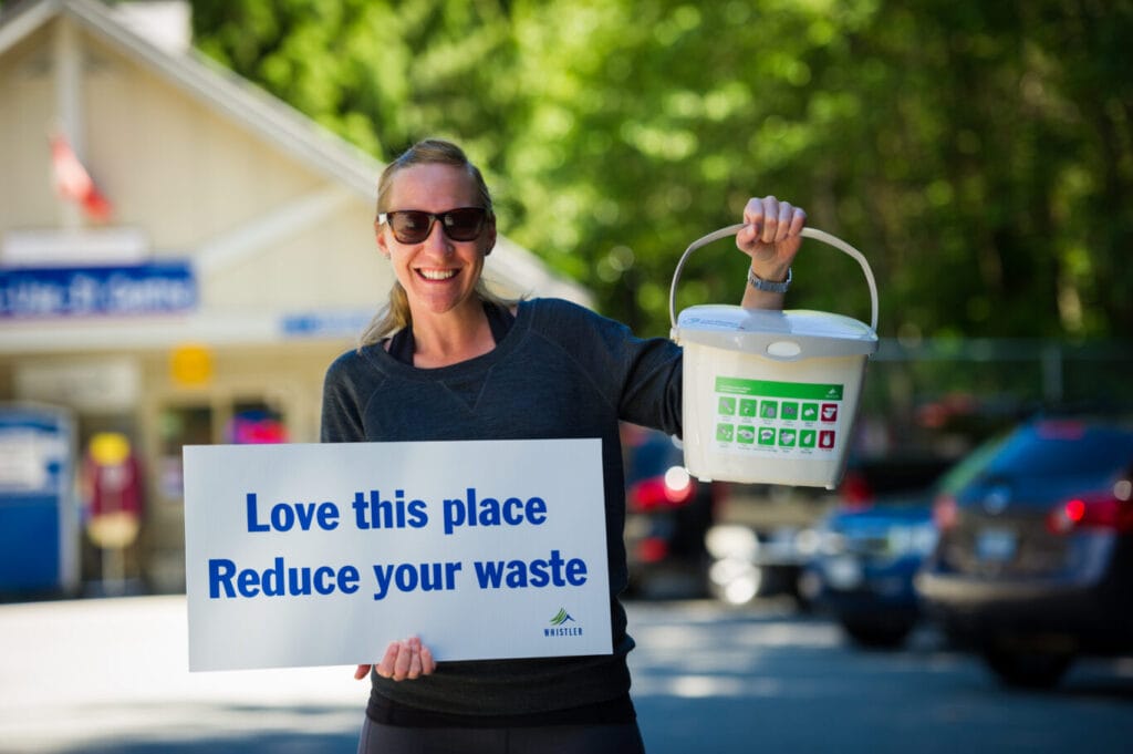 Person holding a compost bucket