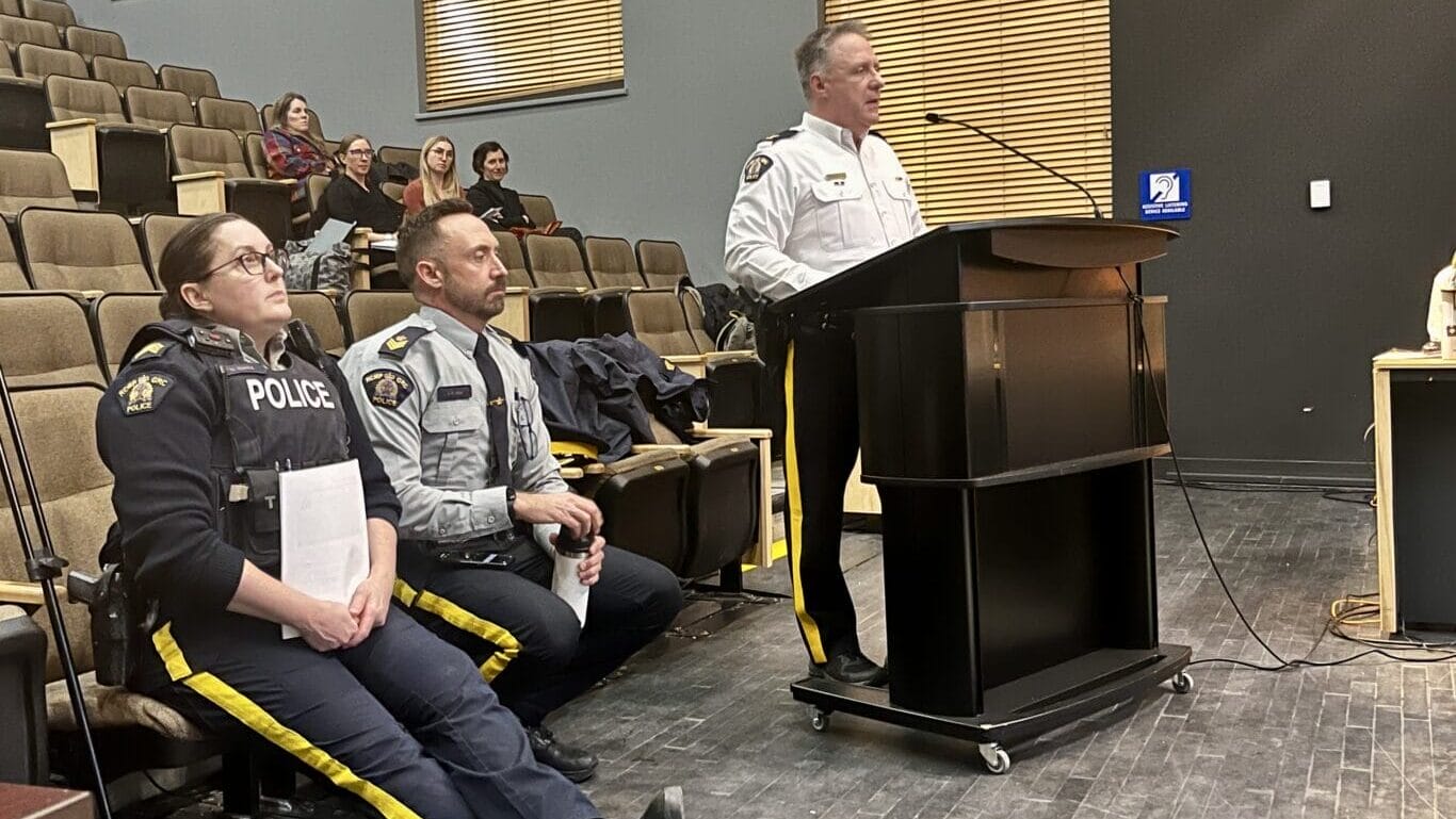 Whistler RCMP Officer-in-Charge Robert Dykstra addresses elected officials at a council meeting.