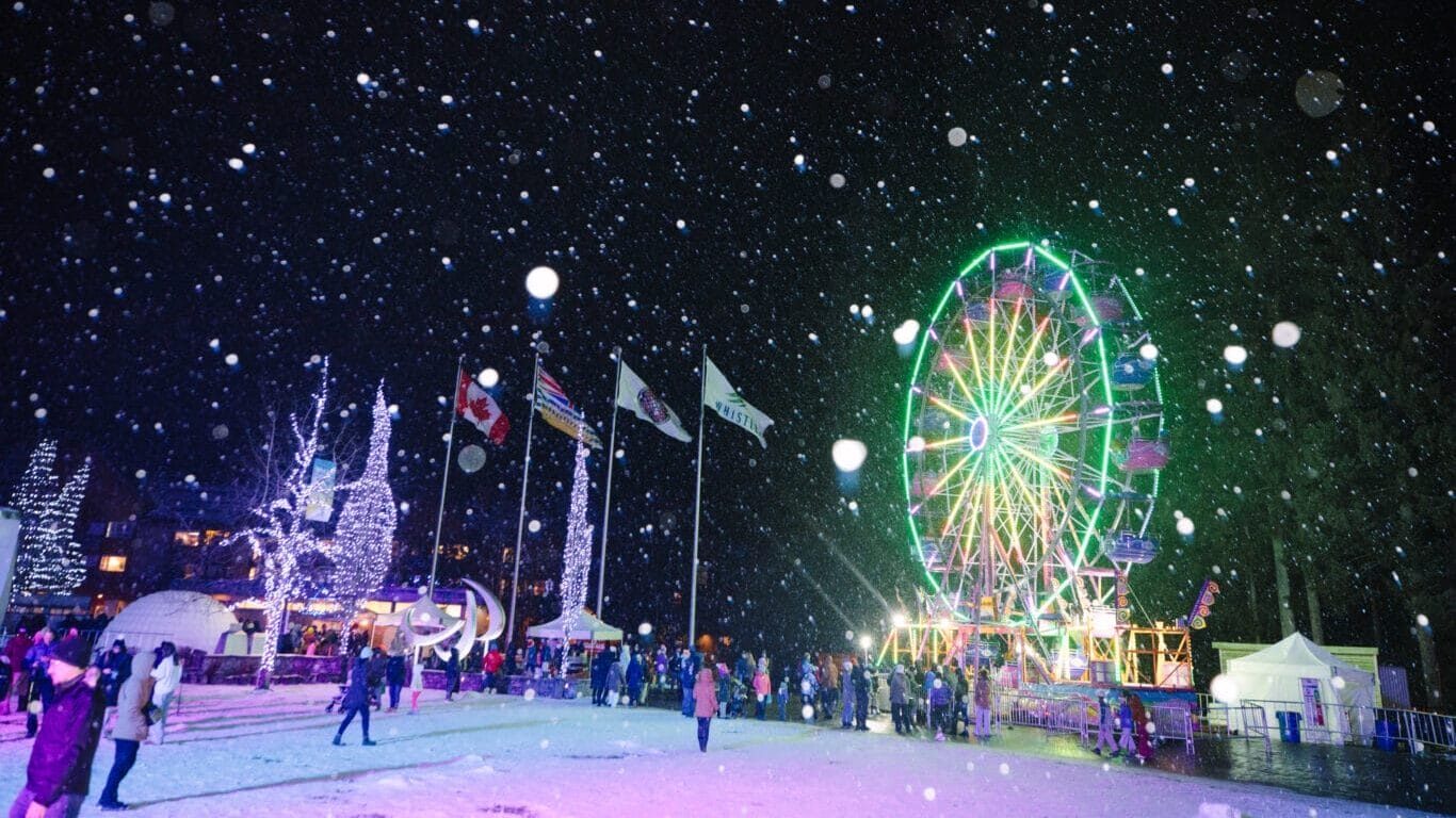 Lights, snow and Ferris wheel at Winterlight